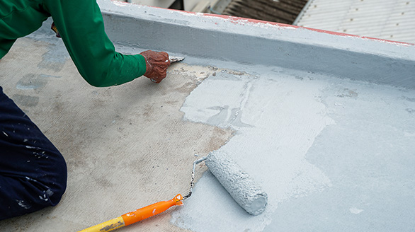workers are fixing cracks floor repairing waterproofing deck flooring